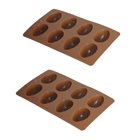 Two brown silicone egg-shaped molds, perfect for making DIY Easter dog treats.