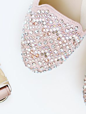 Matching pink rhinestone dog collar and sparkly women's flat shoes, perfect for a stylish dog mum.