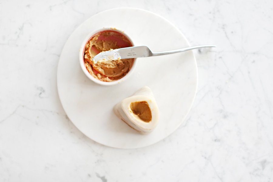 Make your own homemade, healthy peanut butter dog bone filling with our simple two ingredient recipe! Includes full tutorial.