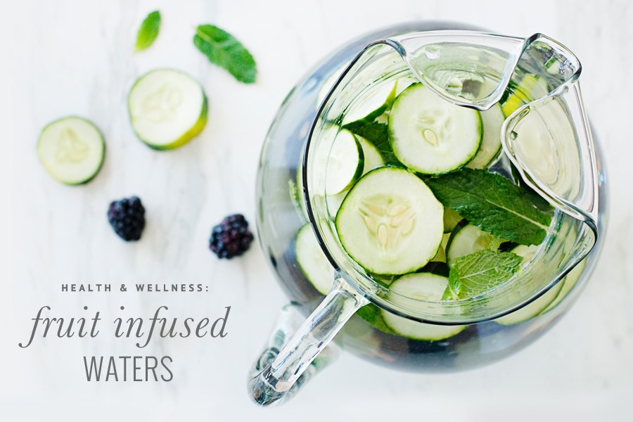 Cucumber and mint fruit infused water in a glass pitcher, a healthy drink for you and your dog.