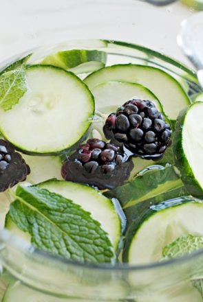 Healthy cucumber, blackberry, and mint infused water, a refreshing hydration treat for dog wellbeing.