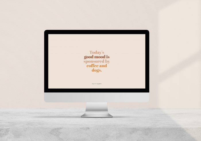 Today's Good Mood is Sponsored by Coffee and Dogs dog mom quote desktop wallpaper displayed on a computer monitor.